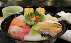 raw meat in black bowl